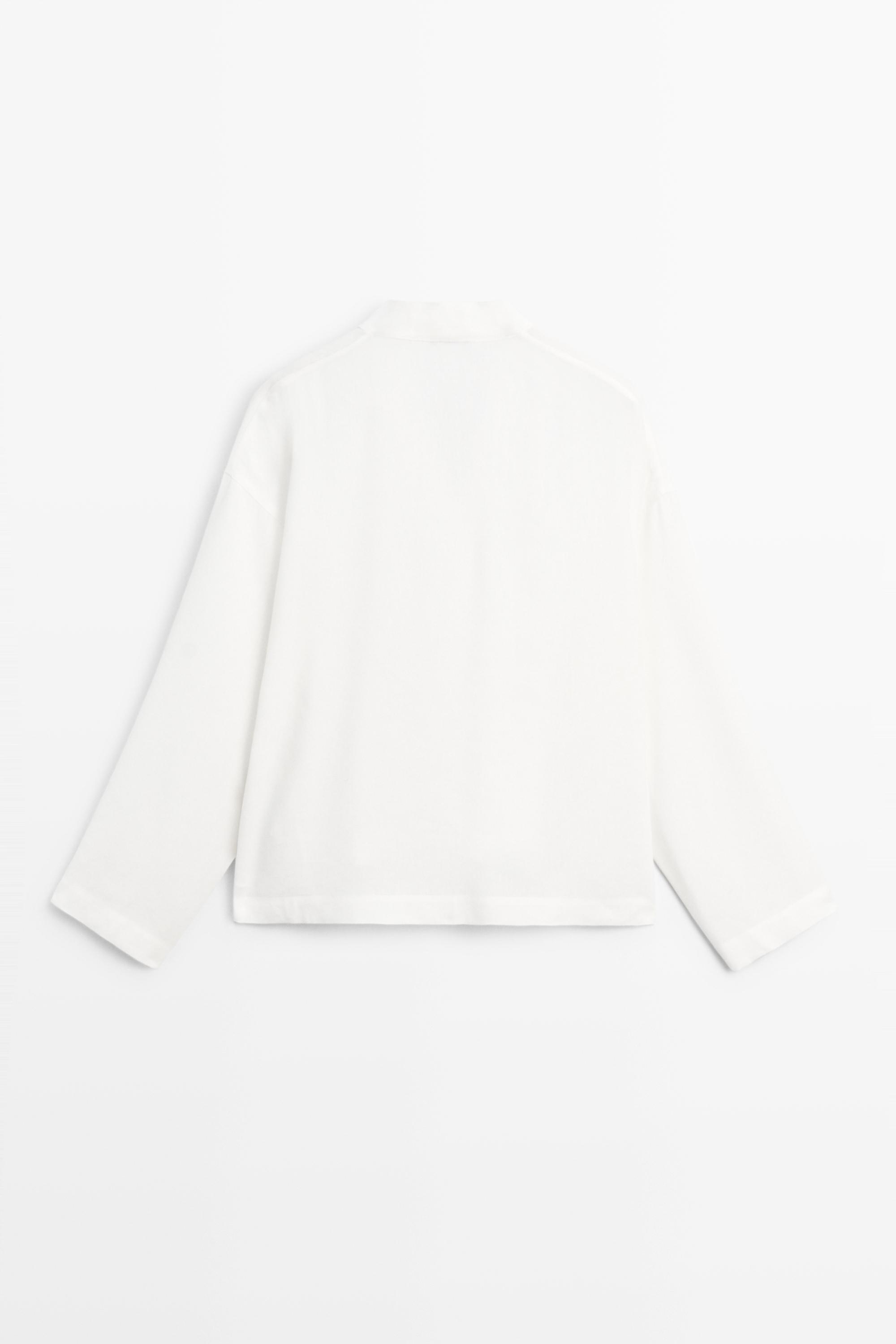 Flowing linen-blend V-neck shirt